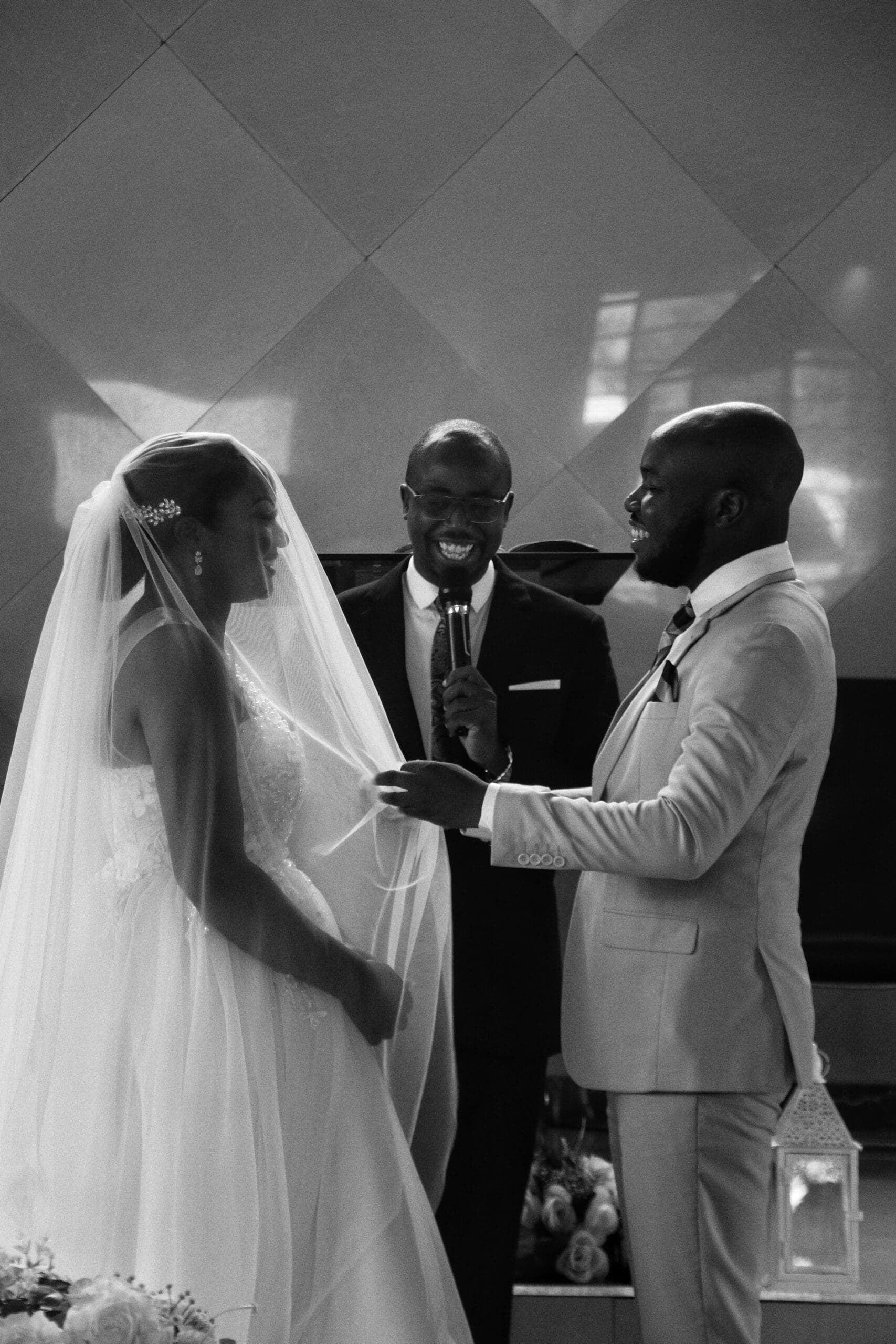 Bride and Groom being blessed by officiant during wedding ceremony